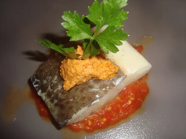 Taco de bacalao confitado de la casa